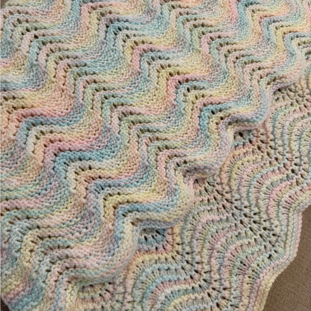 Pastel hand knit baby blanket